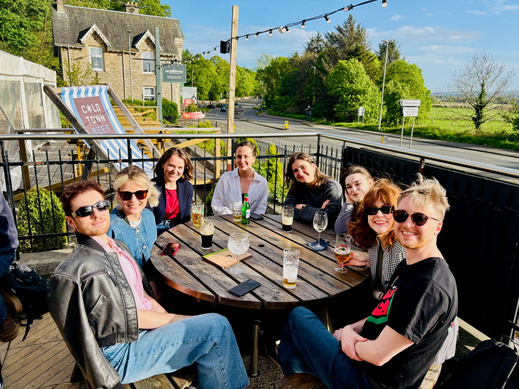 Scottish Lit academics and PG delegates relaxing in the sun